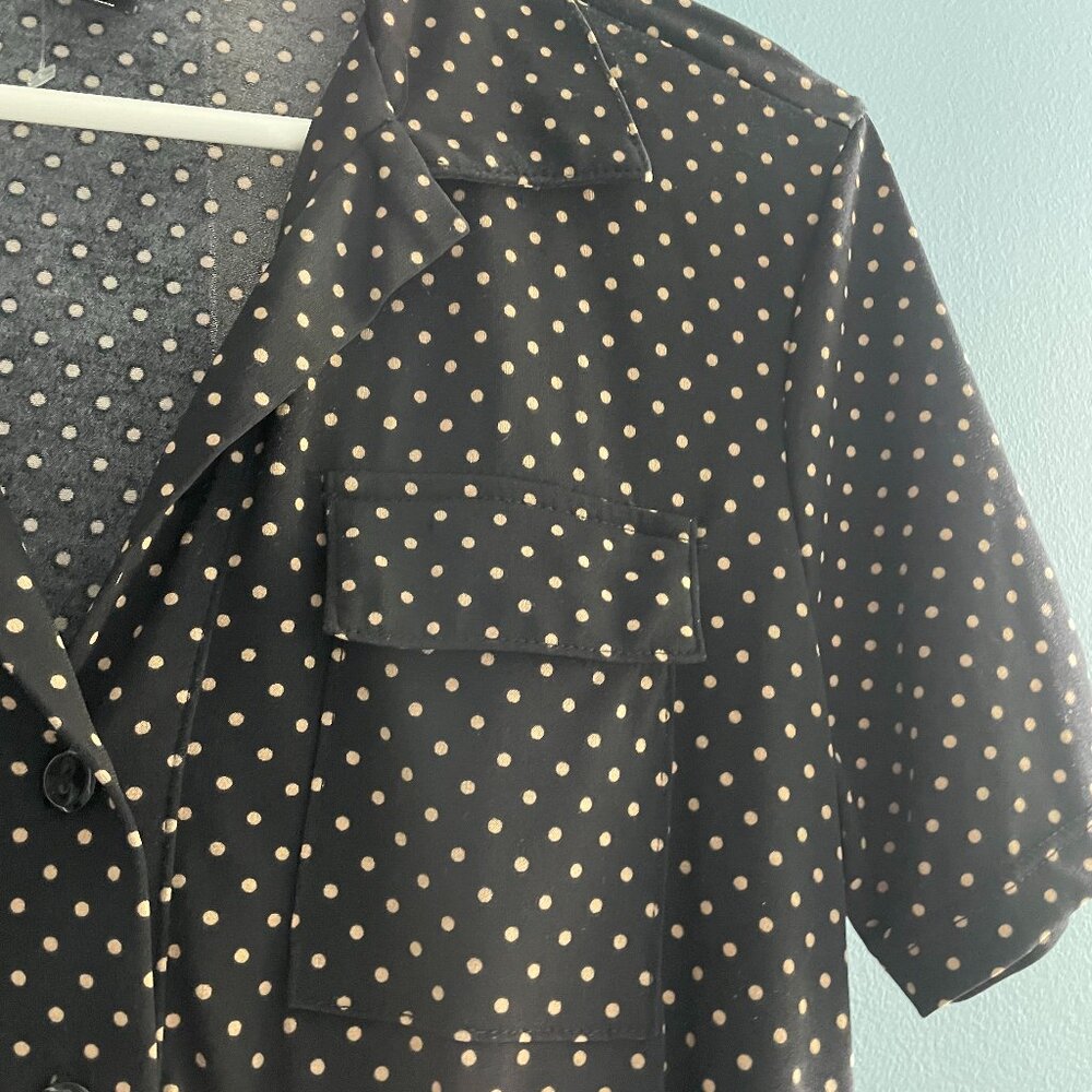 Knee length black dress with tan pin dots, size 8